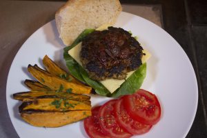 Spicy lamb burger with balsamic tomato relish